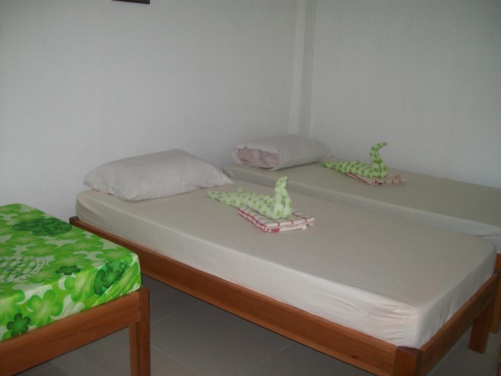 Charm Guest House Puerto Princesa Ruang foto